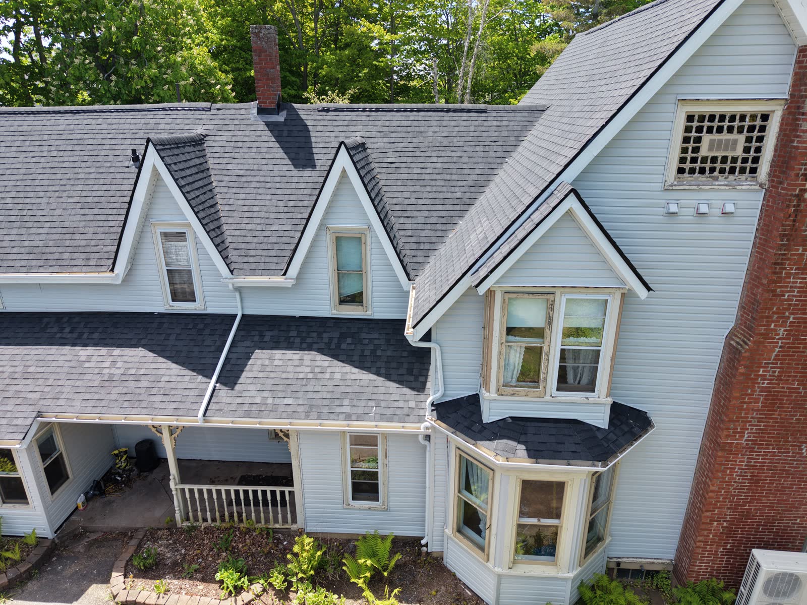 Front elevation of home after roof replacement