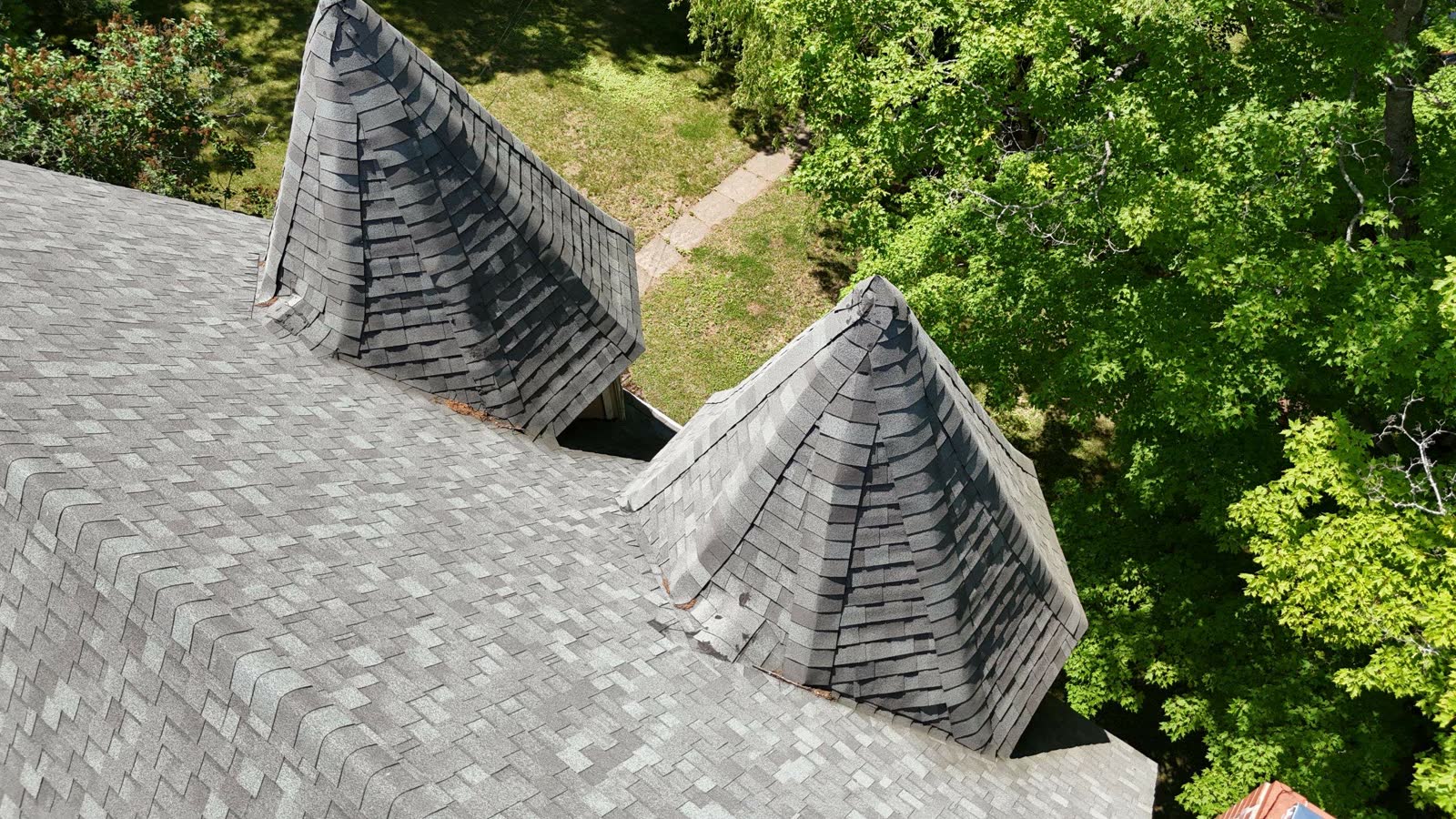Aerial view of twin turret roof before replacement